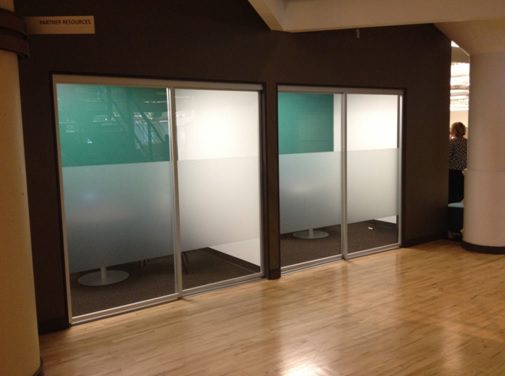 Sliding glass door in a workplace