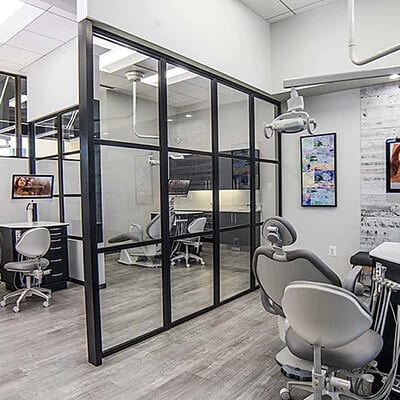 Fixed glass panel divides space in doctor office