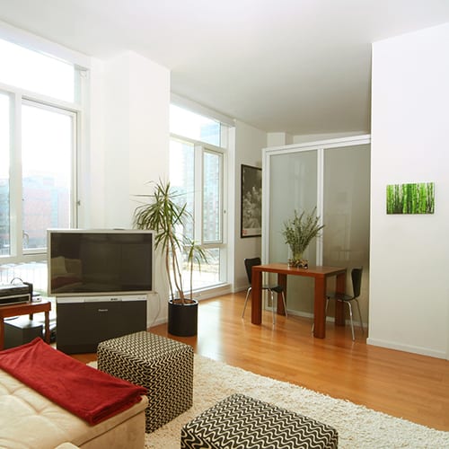 Privacy frosted glass wall separated area from the living room space