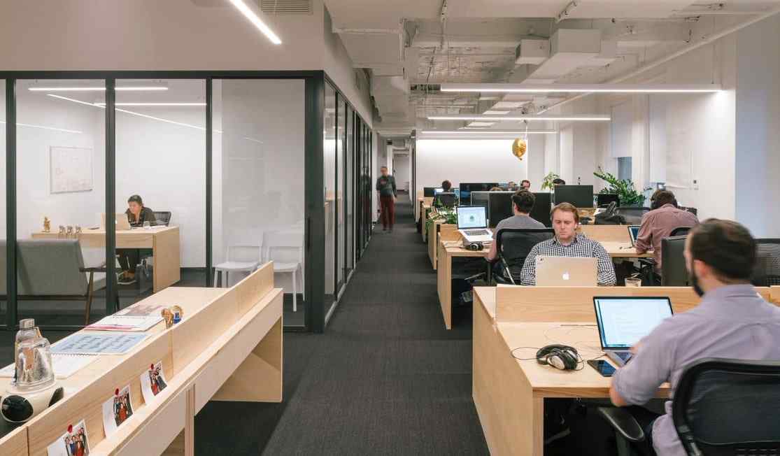 office L shape conference room with glass walls and doors