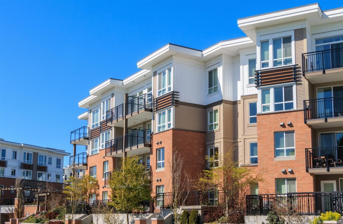 red and white apartment buildings